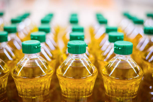 istock vegetable oil in bottle pattern factory warehouse store food background 1497797817