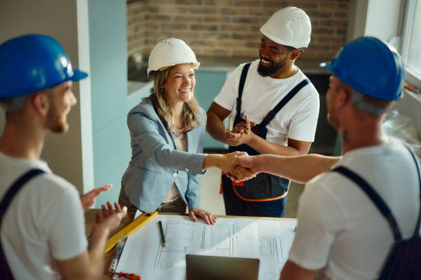 istock Successful deal between architect and manual worker! 1497798723