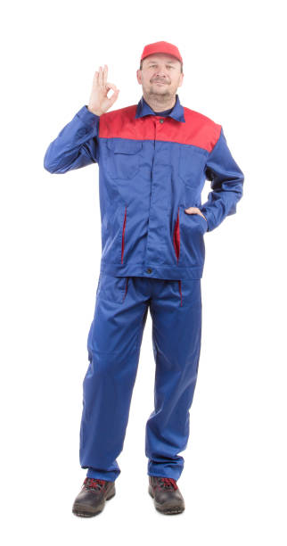 istock A worker in a work suit gives a hand sign 
