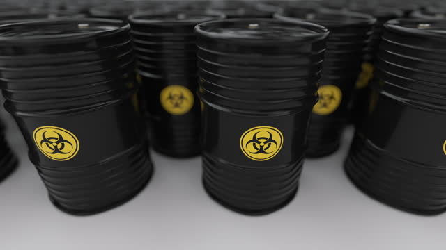 Looping animation of the black barrels with biohazardous waste