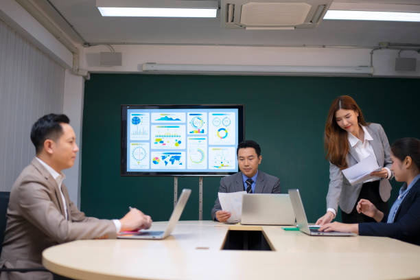 istock White collar worker working and meeting at office. 1497805423