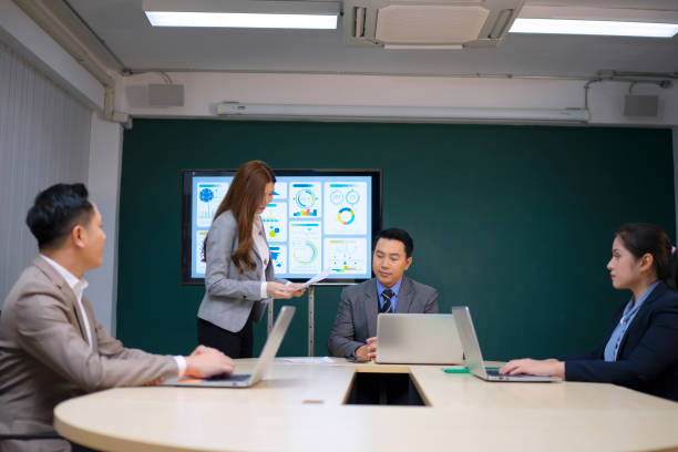 istock White collar worker working and meeting at office. 1497805424