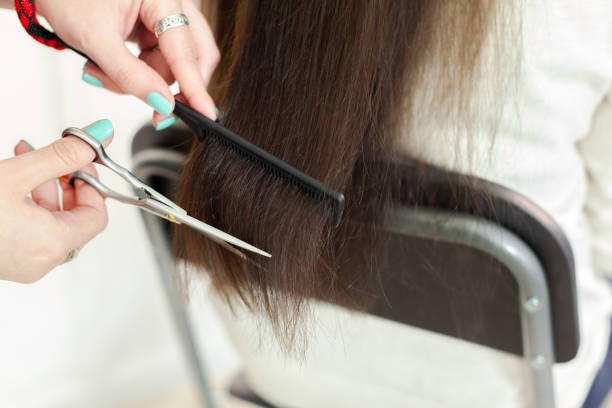 istock Woman does a haircut 1497805588