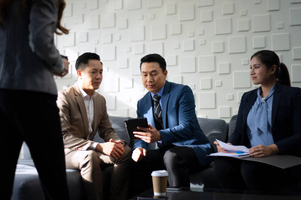 istock White collar worker working and meeting at office. 1497806247