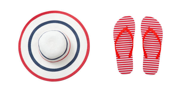 istock Beach accessories flip flops and hat. Summer resort objects collage isolated. 1497806753