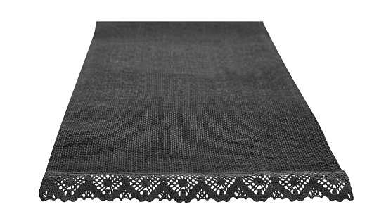 Black Canvas napkin with lace, natural burlap runner perspective isolated on white background. Can used for display or montage product. Selective fokus