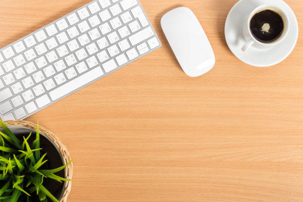 istock working place at wooden desktop with coffee 1497807804