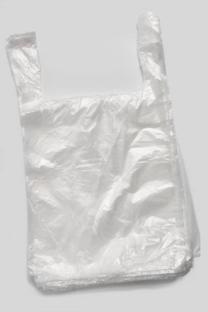 istock white plastic bag on white background. A White Plastic Bag Texture, macro, background. Reduction of plastic bags for natural treatment. The symbol of the campaign to refrain from using plastic bags. 1497814912