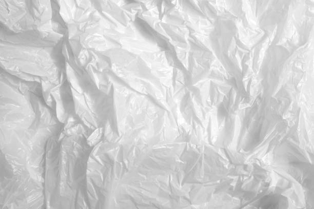 istock white plastic bag on white background. A White Plastic Bag Texture, macro, background. Reduction of plastic bags for natural treatment. The symbol of the campaign to refrain from using plastic bags. 1497815661