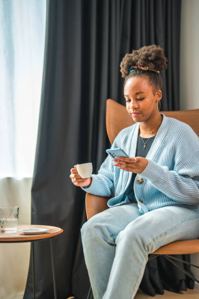 istock Youthful African American Woman Using her Cellphone 1497817815