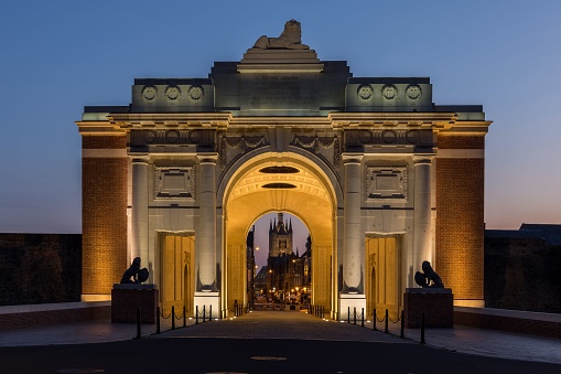 Menin Gate illuminated in the dark in Ypres, Belgium