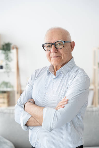 istock Confident elderly man with crossed arms 1497818556