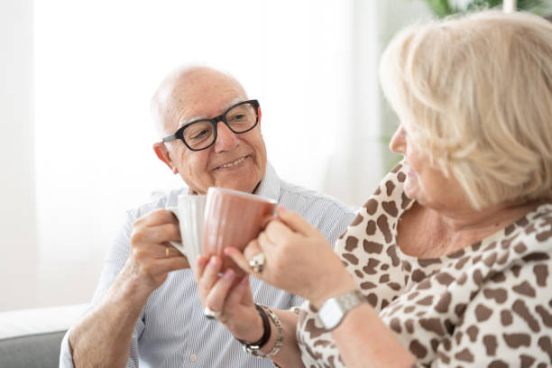 istock Elderly couple relaxing and sharing coffee 1497818609