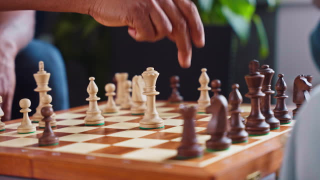 Chess Enthusiasm, Close Up of Hands Playing a Leisure Match