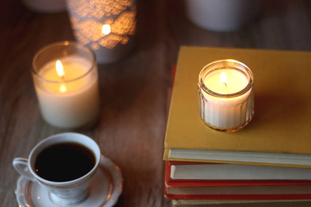 istock Books, Glasses, E-Reader, Pen, Tea, Cookies and Candles 1497825225