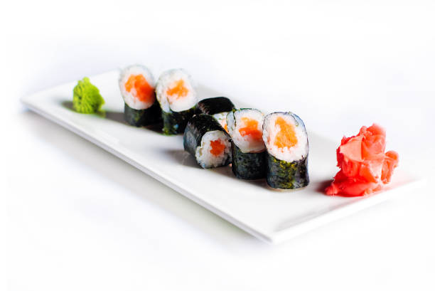 istock Sushi set with salmon and nori isolated on white 1497826857