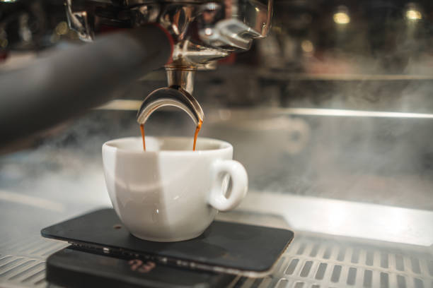 istock Coffee Flowing Through the Machine Creating Liquid Perfection 1497827397