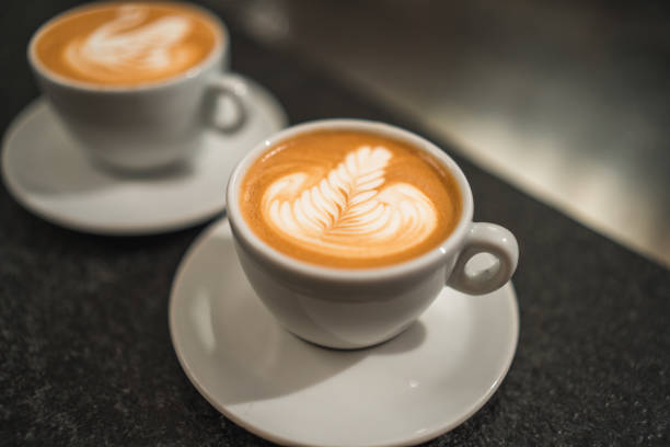 istock Showcasing Latte Art on Coffee Cups for Connoisseurs 1497827399