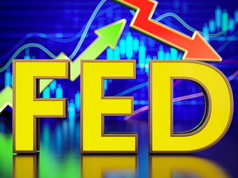 Neon FED Federal Reserve Bank Sign on a Financial Chart with Red and Green Arrows. 3D Render