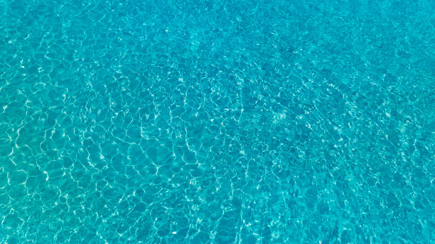 istock Tropical beach water  with crystal clear water on beach background 1497831857