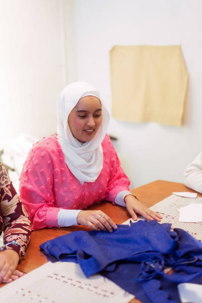 istock Small Group of Multicultural People Discussing Upcycling Workshop 1497831924