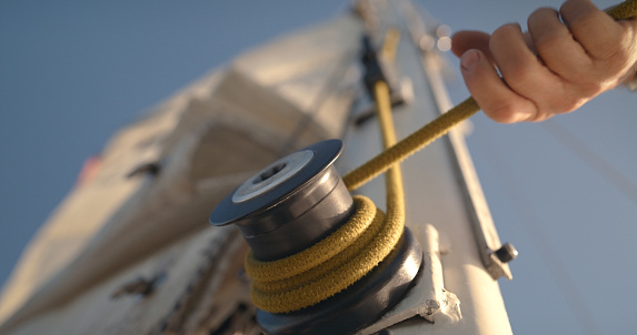 A few meters of rope on a large metal drum on a trawler.