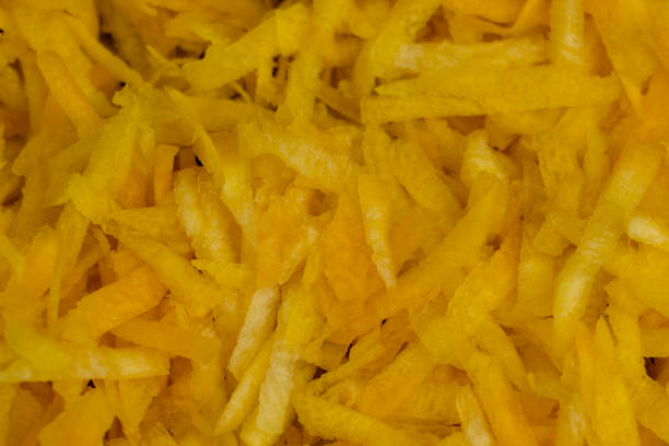 istock Sliced into thin slices of bright yellow carrots in the kitchen 1497839287