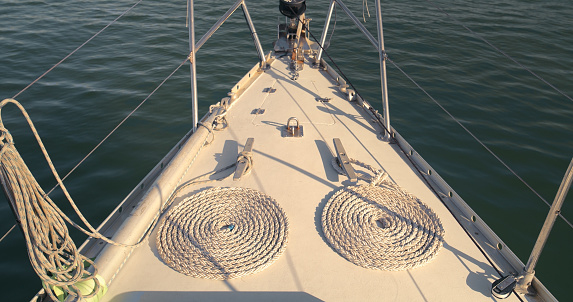 Bodrum, Turkey, 18 October 2016: Traditional Turkish Boat or Gulet cruising at sea. Touristic Sail Boats near the beach of Bodrum, Aegean Turkey. Gulets are traditional boats that take visitors on long or short trips along the beautiful coastline.