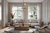 Comfortable living room with sofa and windows