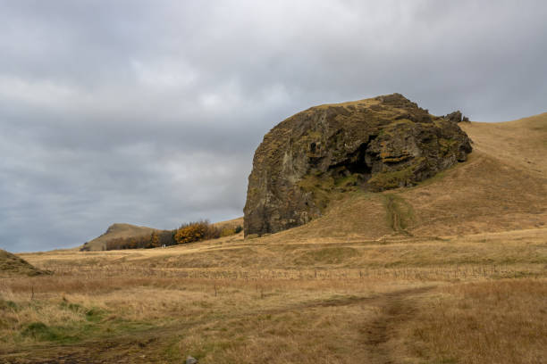 istock Pasture and a rock in the autumn, Iceland 1497851783