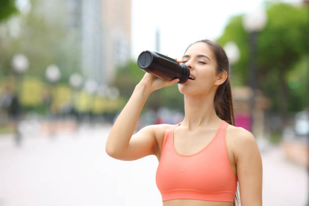 istock Runner drinking in the street 1497855073