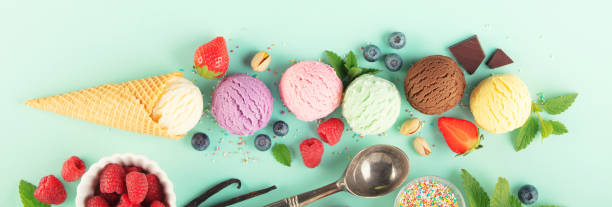 istock Flying ice cream balls and ingredients on pastel light blue background 1497857381