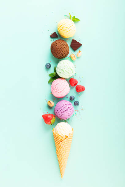 istock Flying ice cream balls and ingredients on pastel light blue background 1497857384