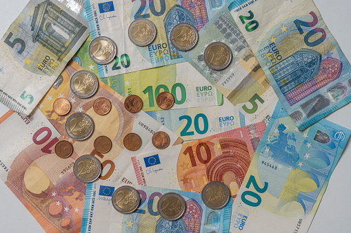 Still life. Close-up view of euro banknote and coins