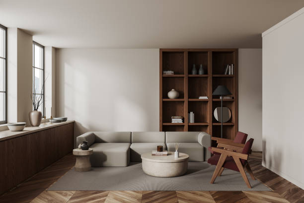 istock White living room interior with two armchairs, sofa and bookcase 1497859736