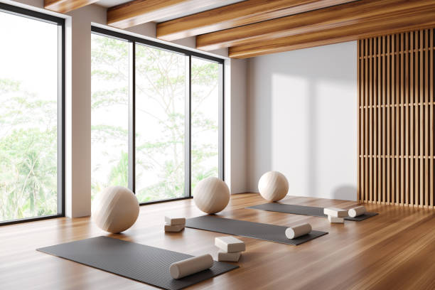istock Modern gym class interior with sport equipment and panoramic window 1497859833