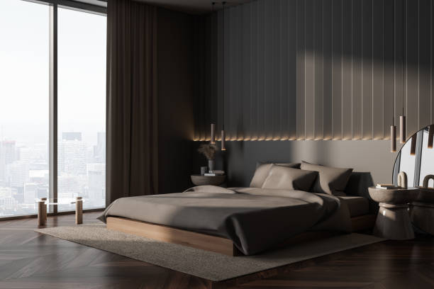istock Dark bedroom interior with bed and minimalist decoration, panoramic window 1497860786