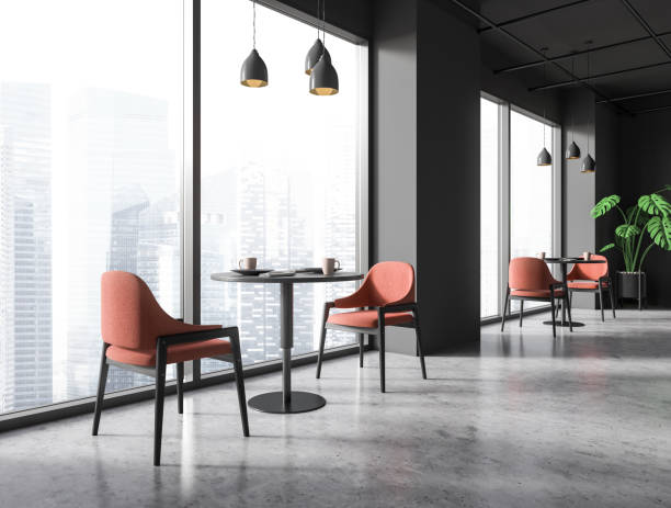 istock Panoramic gray cafe interior with round tables and chairs 1497861096