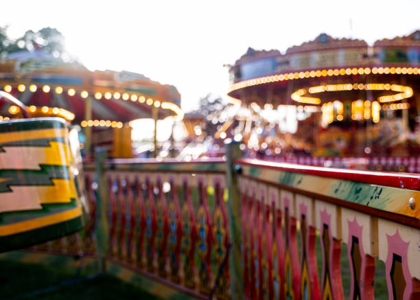 Vintage steaming powered fairground rides of a travelling fair