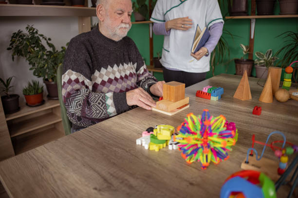 istock Toy stimulation for dementia patient 1497862659