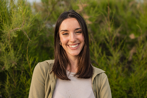 portrait of pretty young happy smiling caucasian woman