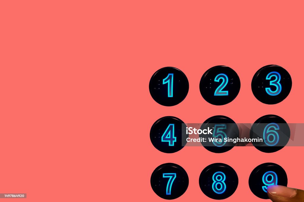 Woman finger press on number nine Woman finger press on number nine on keypad use for web design  and wallpaper background Adult Stock Photo