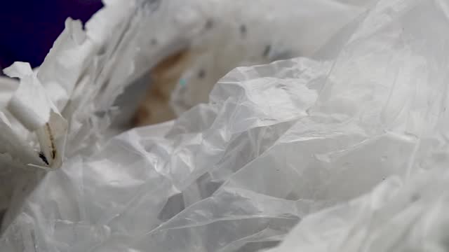 Massive piles of trash filled with plastic bags are being thrown away more and more every day.