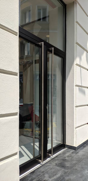 istock Glass partition mockup and modern doors in hall 1497868644