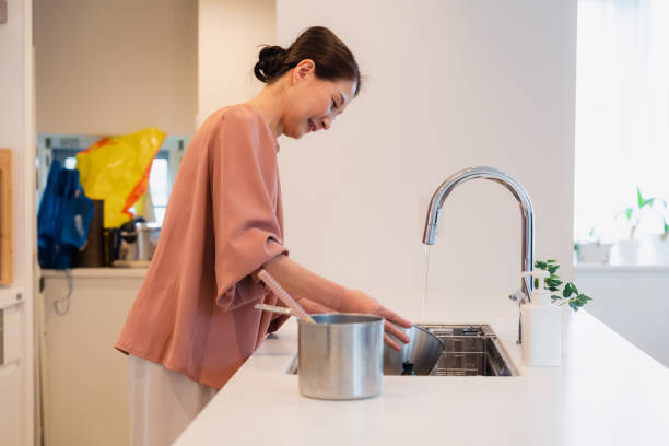 istock A senior woman cooking in the kitchen 1497868727