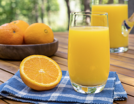 Freshly squeezed orange juice of untreated organic oranges from the own garden, part of an E+ and S+ series