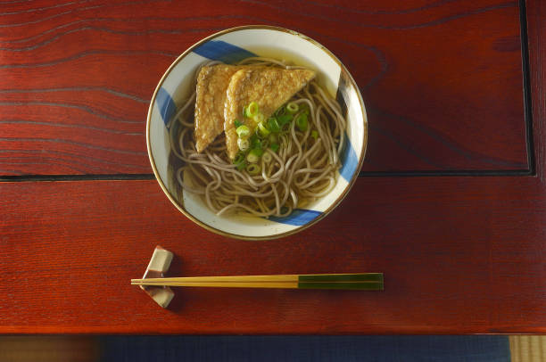 istock Kistune Soba on the Wooden Table 1497872356