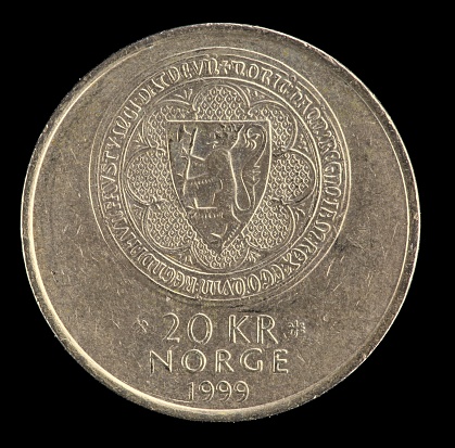 20 Kroner Norwegian golden coin with coat of arms.