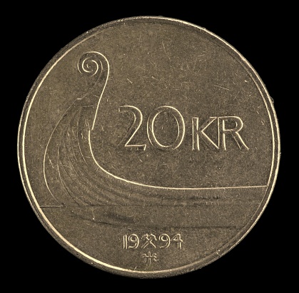 20 Kroner Norwegian golden coin with viking ship prow.