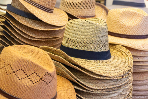 istock a stall selling straw hats in a market place 1497874112